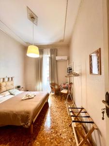 Postel nebo postele na pokoji v ubytování Casa Jolanda B&B