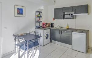 a kitchen with a sink and a dishwasher at Gorgeous Apartment In Dunkerque With Wifi in Dunkerque