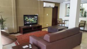 TV a/nebo společenská místnost v ubytování Hotel Rouver