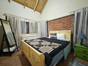 Ένα ή περισσότερα κρεβάτια σε δωμάτιο στο Teonil