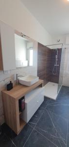 a bathroom with a sink and a mirror at Casa Tintoretto The Charm of Venice in 15 minutes! in Venice +9 photos