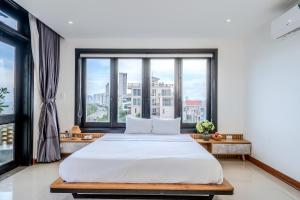 Ένα ή περισσότερα κρεβάτια σε δωμάτιο στο Svy Ocean View Villa - Beachfront - Only 20m to the Beach