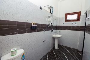 Ένα μπάνιο στο Lisa Homestay Yala