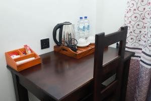 Ένα ή περισσότερα κρεβάτια σε δωμάτιο στο Lisa Homestay Yala