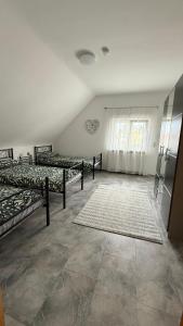 Postel nebo postele na pokoji v ubytování Adler Haus