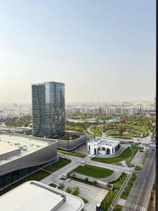 Nespecifikovaný výhled na destinaci Taškent nebo výhled na město při pohledu z apartmánu + 29 fotografií