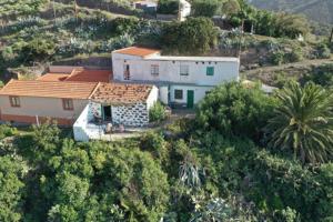 an aerial view of a house on a mountain at Casa Edelmira Apartment in Vallehermoso +7 photos