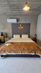 Postel nebo postele na pokoji v ubytování Vila Carmen Imperial