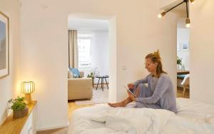 Postel nebo postele na pokoji v ubytování KönigsSCHLAF No9 - Das Hide-away in der Altstadt