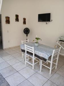 TV a/nebo společenská místnost v ubytování Chalé Maresias