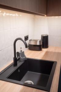 Η κουζίνα ή μικρή κουζίνα στο Ground Living