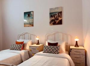 Ένα ή περισσότερα κρεβάτια σε δωμάτιο στο Moon Guest House