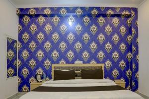 Katil atau katil-katil dalam bilik di Hotel O BR INN