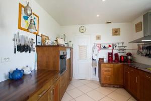 Kuchyň nebo kuchyňský kout v ubytování Tipoz'Immo-Les Coquillages - vue mer - animaux bienvenus - confort -calme + 11 fotografií