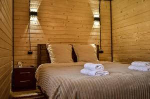 Postel nebo postele na pokoji v ubytování Йоцвіт