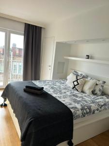 Ένα ή περισσότερα κρεβάτια σε δωμάτιο στο Très beau penthouse à Knokke