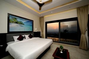 Μια τηλεόραση ή/και κέντρο ψυχαγωγίας στο Honey Villa +27 φωτογραφίες