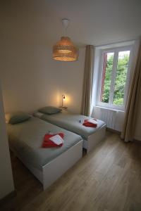 Postel nebo postele na pokoji v ubytování Le Marteley T4 + 24 fotografií