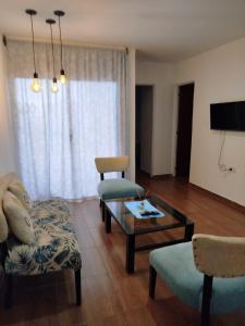 TV a/nebo společenská místnost v ubytování Edificio Rey Niño