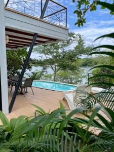 a view of a swimming pool from a house at Villas Isla Escondida in Boca Chica