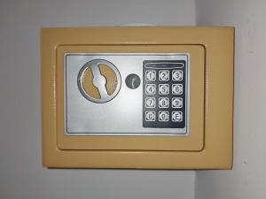 a gold object with a cup of coffee on it at Le Jasmin Appartement in Dar el Haj Ahmed Souid