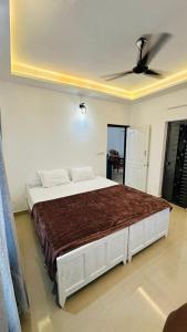 Ένα ή περισσότερα κρεβάτια σε δωμάτιο στο Blue hill residency