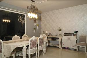 a dining room with a table and chairs at 2Bhk Home By Da Alohas Mukhteshwar in Mukteswar