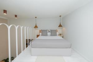 Ένα ή περισσότερα κρεβάτια σε δωμάτιο στο Boho Park Retreat - Kraków Parkowa 1a