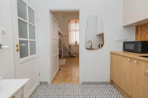 Η κουζίνα ή μικρή κουζίνα στο Boho Park Retreat - Kraków Parkowa 1a +7 φωτογραφίες