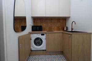 Η κουζίνα ή μικρή κουζίνα στο Boho Park Retreat - Kraków Parkowa 1a