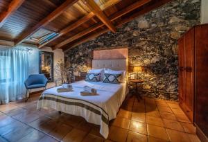 Ένα ή περισσότερα κρεβάτια σε δωμάτιο στο Casa Justa