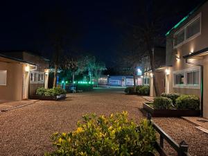 a driveway of a house at night at Tribales del Este in Gualeguaychú