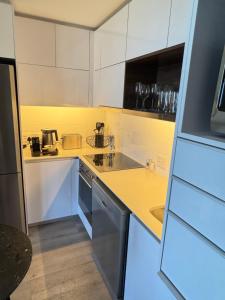 Η κουζίνα ή μικρή κουζίνα στο City Slick Hideaway