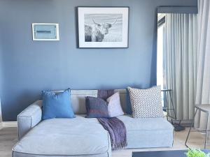 Ένα ή περισσότερα κρεβάτια σε δωμάτιο στο City Slick Hideaway