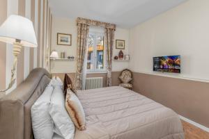 Postel nebo postele na pokoji v ubytování La corte di Danilo