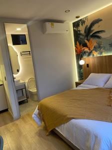 Ένα ή περισσότερα κρεβάτια σε δωμάτιο στο Hotel Ryo 74b Piso 7 Vip