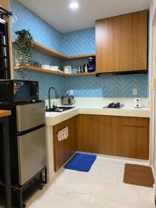 Η κουζίνα ή μικρή κουζίνα στο LacambraHills Olongapo Studio3