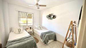 Кровать или кровати в номере Relax And Calm in the Sea by Deihu Experiences +19 фотографий