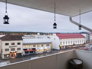 a view of a city from a balcony at Aurora Family Suite in Rovaniemi +16 photos