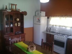 Køkken eller tekøkken på Cabaña TayiMapu