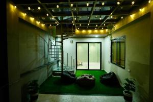 Posezení v ubytování Villa Vista - 3BHK Penthouse + 22 fotografií