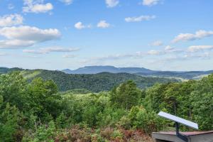 a view of the mountains from the top of a hill at John Wayne View cabin in Del Rio