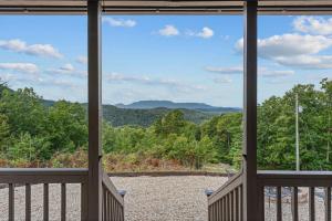 a view from the front porch of a house at John Wayne View cabin in Del Rio
