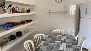 Η κουζίνα ή μικρή κουζίνα στο Casa na praia Bertioga