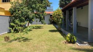 Κήπος έξω από το Casa na praia Bertioga