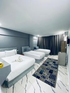 Ένα ή περισσότερα κρεβάτια σε δωμάτιο στο HoTEL NADA