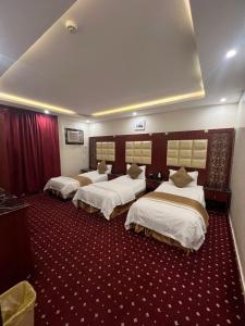 Ένα ή περισσότερα κρεβάτια σε δωμάτιο στο hotel asis altaaj