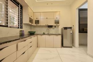 Kuchyň nebo kuchyňský kout v ubytování Villa Vista - 3BHK Penthouse + 22 fotografií