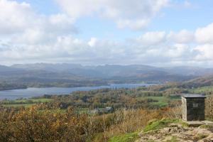a view of a lake in the hills at Windermere Bed and Breakfast in Windermere
