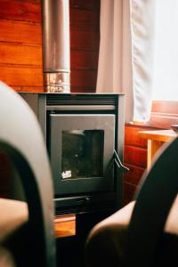 TV a/nebo společenská místnost v ubytování Cabanas Mirante + 78 fotografií